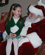 little girl with Santa Claus